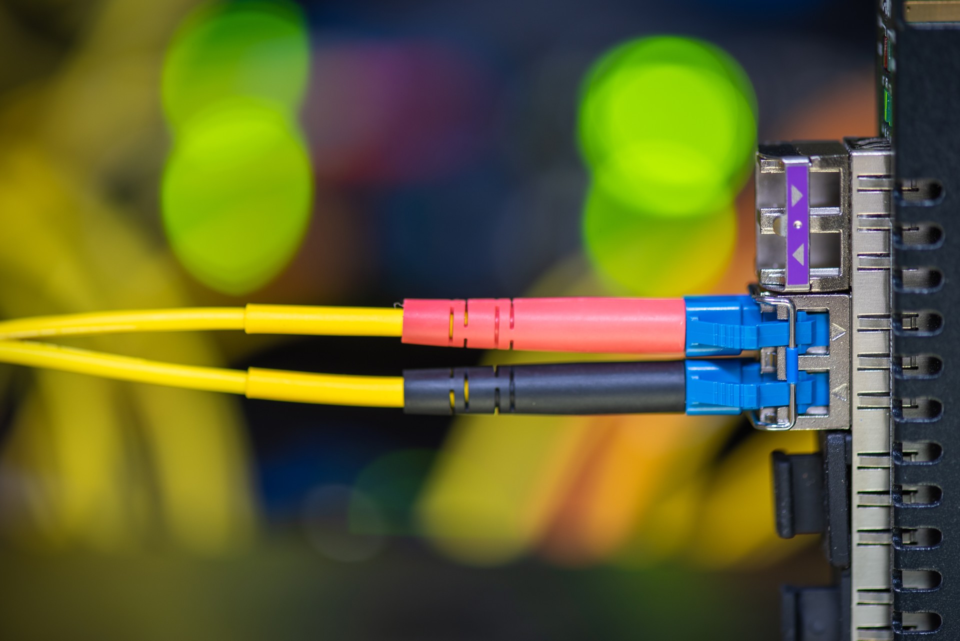 Gigabit technology, fiber optic patch cord cable connected to switch in data center