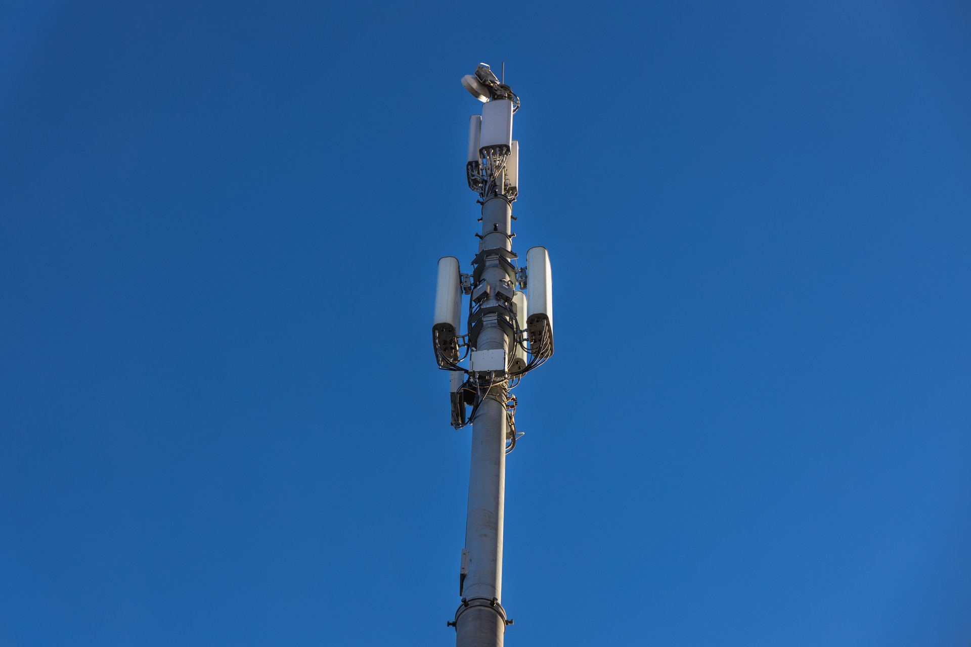 Close up of antenna repeater tower on blue sky