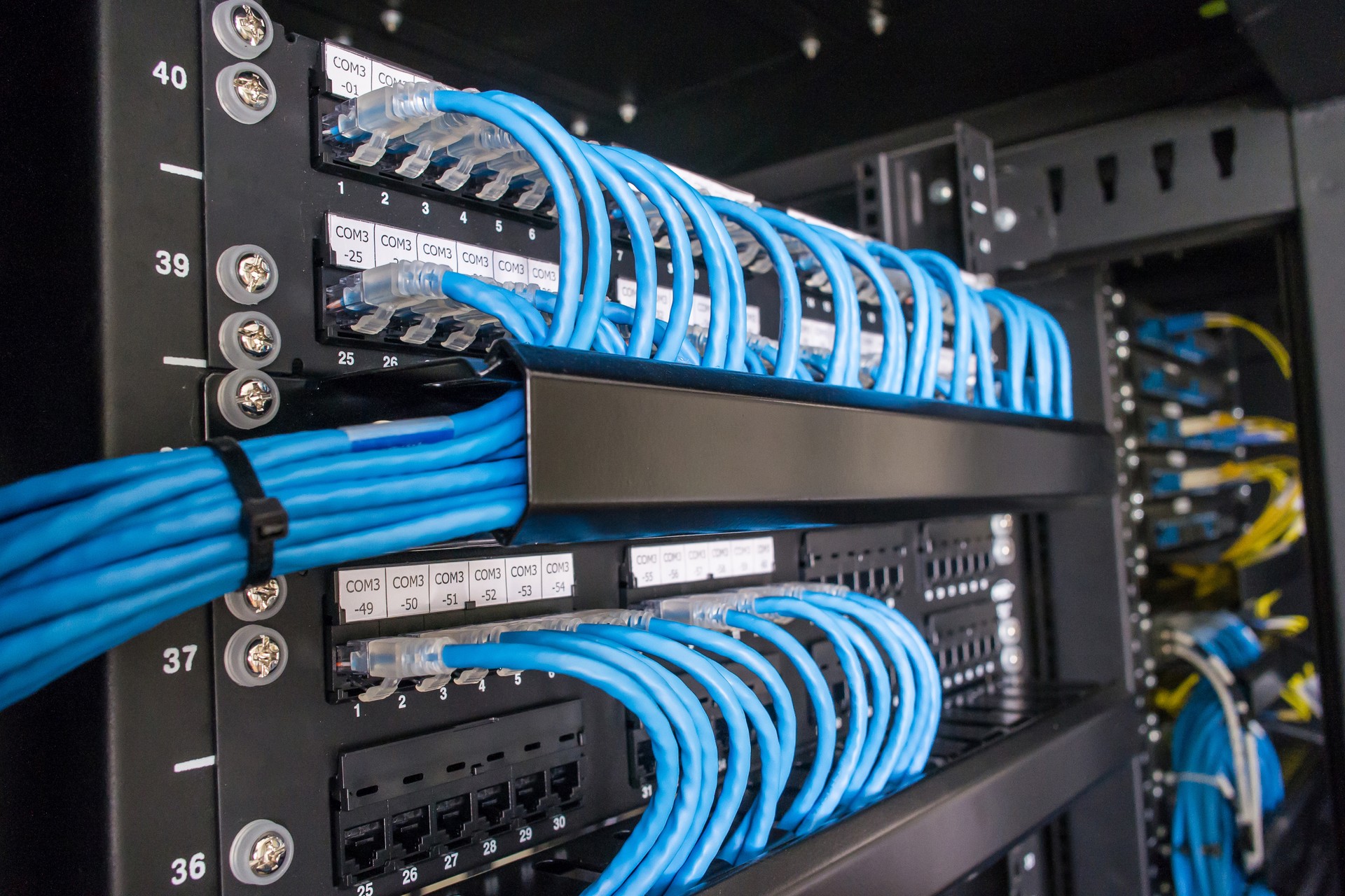 Ethernet cables and path panel in rack cabinet